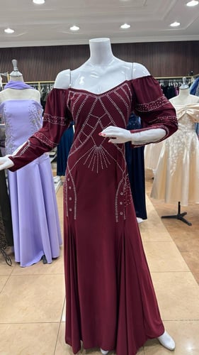 فستان عودي يده تل