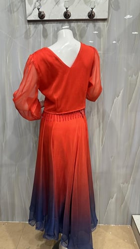 قطعتين تنوره و بلوزه اورنج و ازرق مموج