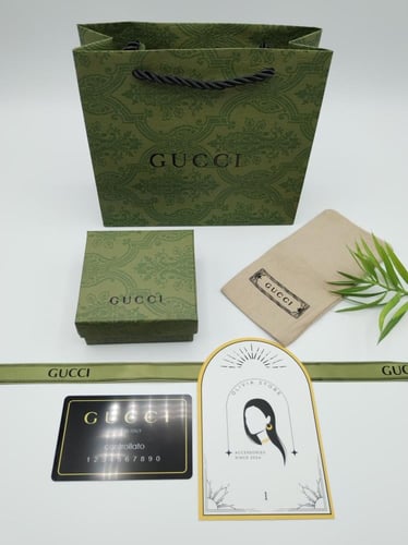 طقم سلسال وحلق قوتشي