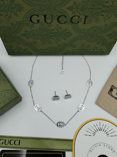 طقم سلسال وحلق قوتشي