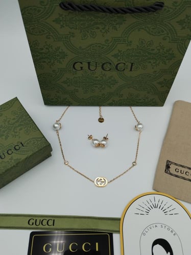 طقم سلسال وحلق قوتشي