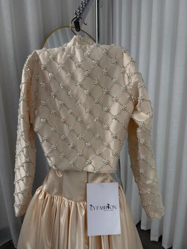 فستان سهرة كلفه خرز لول تفته