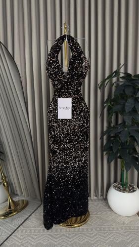 فستان سهرة ترتر بعده اللوان