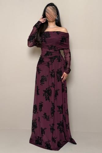 Long burgundy-purple off-shoulder dress with a black velvet floral pattern by Mleha.