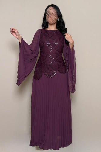 فستان بنفسجي رسمي بقصة أنثوية أنيقة من مليحة