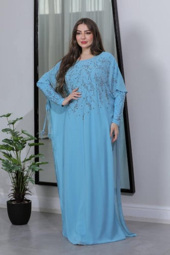 فستان واسع تركواز مزين بالفصوص مع بطانة ساترة