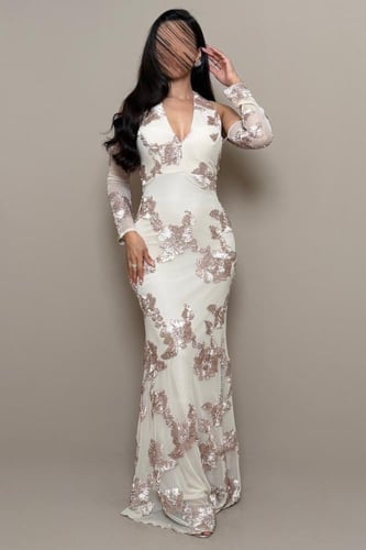 فستان بيج بتطريزات بارزة وقصة أنثوي