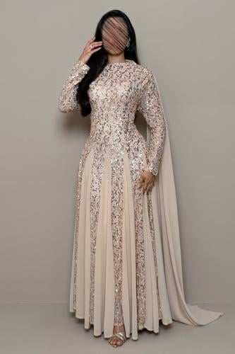 Long beige dress with sequins and a back shawl.