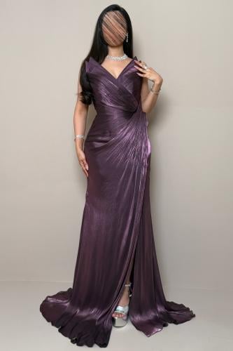 Long Purple Dress with a Shimmering Design and Elegant Pleats