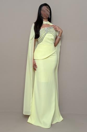 Yellow evening dress with a chiffon shawl and luxurious crystal embellishment.