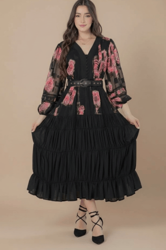 فستان ميدي ملون بطبعات ورود وكسرات من الاسفل