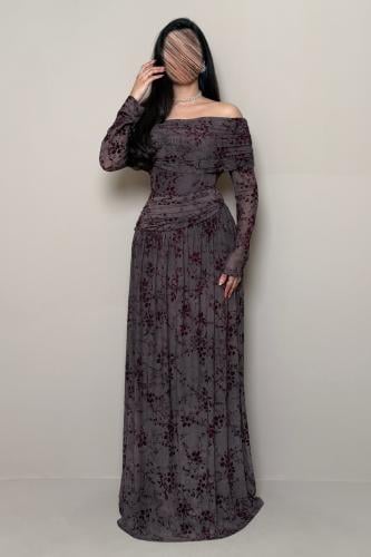 Long brown dress with off-shoulder sleeves and burgundy velvet floral pattern.