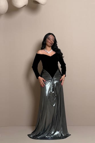 فستان سهرة أسود وفضي بتصميم أنيق من مليحة