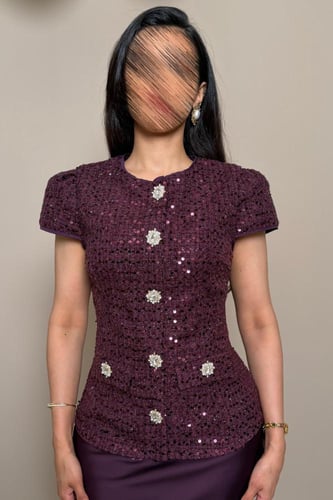 طقم تنورة وبلوزه بنفسجي بتفاصيل انيقة