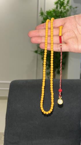 A prayer bead with a clasp