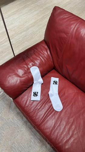 White socks from the brand New Era featuring the N...
