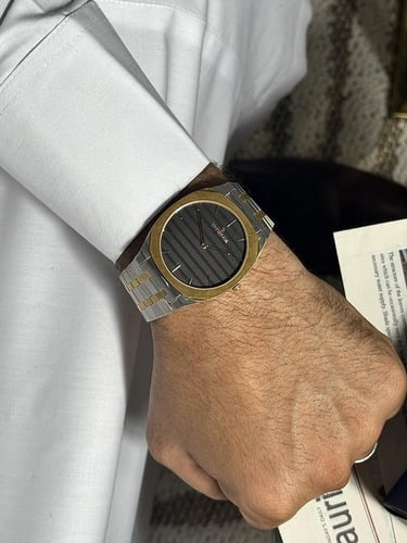 ساعة سفيسروز ستيل رجالي فضي و ذهبي