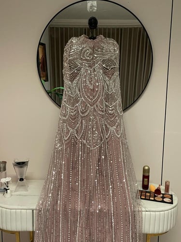 فستان سهرة طويل مزين بالترتر والخرز لونين