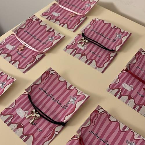 توزيعات العيد 7 اساور مع الكرت