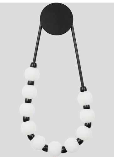 ابليك جداري مودرن أسود فاخر شكل عقد قطر 60 سم إنار...