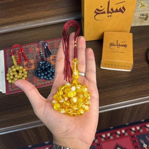 A prayer bead with a clasp - transparent marbled c...