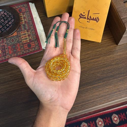 مستكه الماني نواعم - شفاف خرز اسطواني كركوشه زيتي