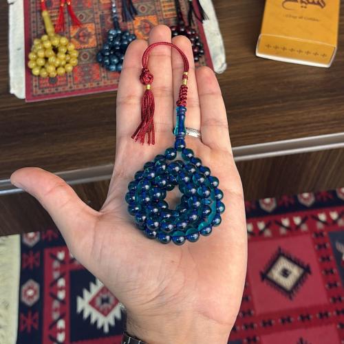 A prayer bead with soft beads - transparent navy b...