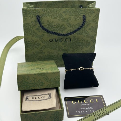 سوارة قوتشي ستيل ذهبي