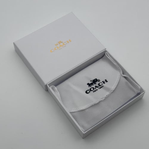 حامل بطاقات عمل كوتش احمر بشعار ذهبي