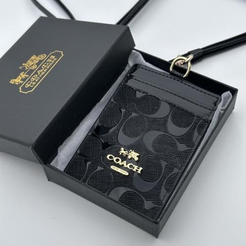 حامل بطاقات عمل كوتش اسود لامع بشعار ذهبي