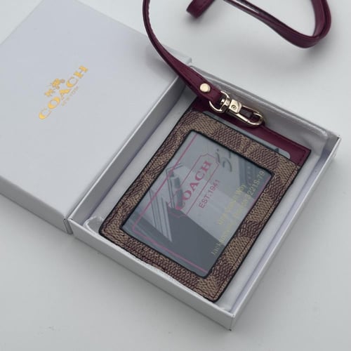 حامل بطاقات عمل كوتش احمر بشعار ذهبي