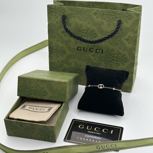 سوارة قوتشي ستيل ذهبي