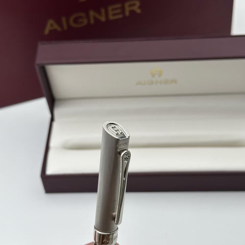 قلم اقنر فضي واسود سادة