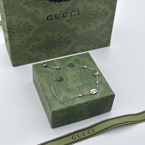 سوارة قوتشي ستيل فضي