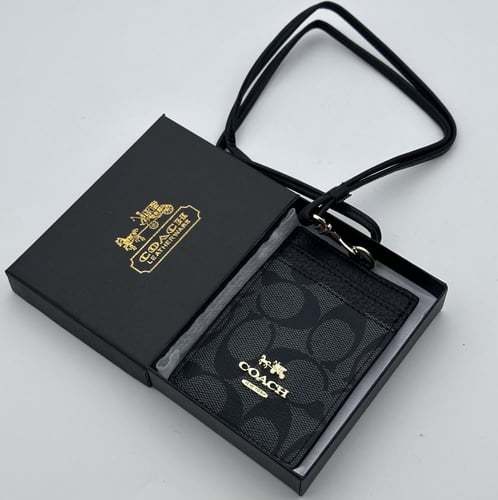 حامل بطاقات عمل كوتش اسود بشعار ذهبي 1