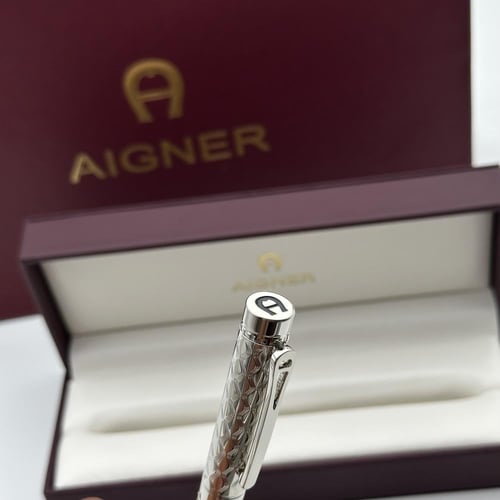 قلم اقنر فضي مزخرف