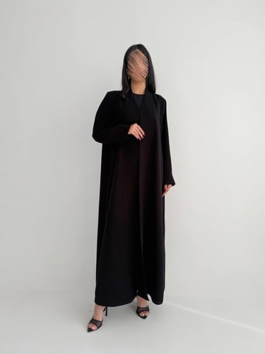 الدرة | بقماش الكريب الاندونيسي الأسود كلوش وبقصة...