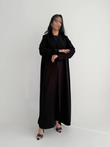 الدرة | بقماش الكريب الاندونيسي الأسود كلوش وبقصة...