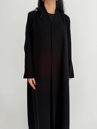 الدرة | بقماش الكريب الاندونيسي الأسود كلوش وبقصة...