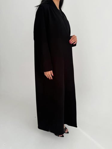 الدرة | بقماش الكريب الاندونيسي الأسود كلوش وبقصة...