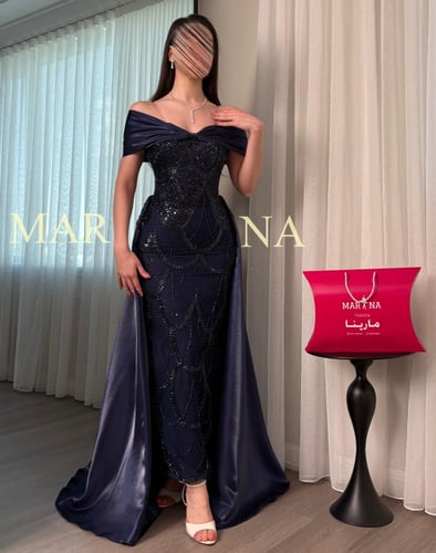 فستان رمشه(فستان كحلي شك سهره فيونكه وذيل ميكادو ل...