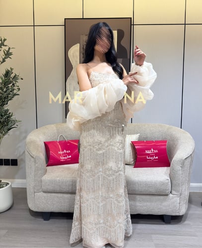 فستان ولاء (فستان بيج شك سهره وجاكت جازار )