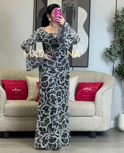 فستان ماجده كحلي (فستان كحلي شك سهره بطانه تفته)