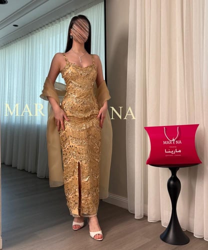 فستان وجدان (فستان ذهبي شك سهره وشال جزار )