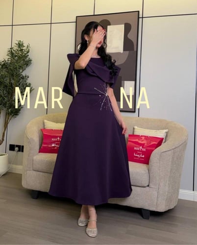 فستان لورا (فستان ليلكي باربي مع تطريز اليدوي )