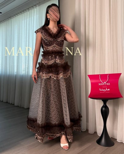 فستان ابرار (فستان موكا شك سهره كسرات بالتل كلوش)