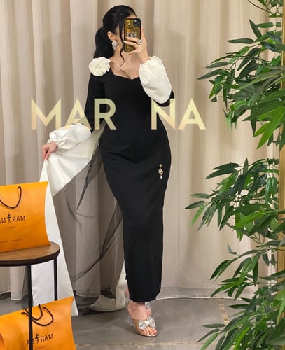 فستان ملاك (فستان كريب مع ذيل ووردة كتف كم منفوش)