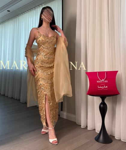 فستان وجدان (فستان ذهبي شك سهره وشال جزار )