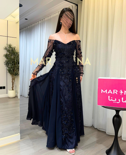 فستان مارتيا كحلي (فستان كحلي شك مزين بالورود تدخي...