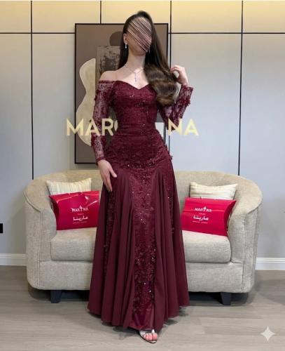 فستان مارتيا العودي (فستان عودي شك مزين بالورود تد...